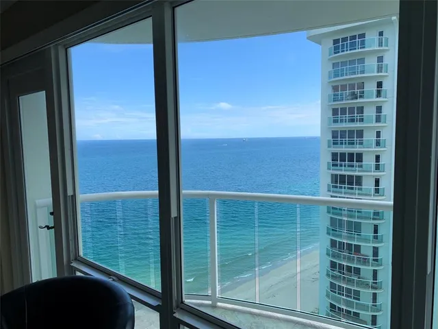a view of ocean with beach
