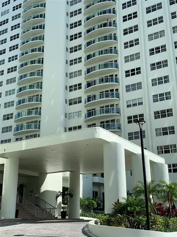 a picture of a book and a white wall