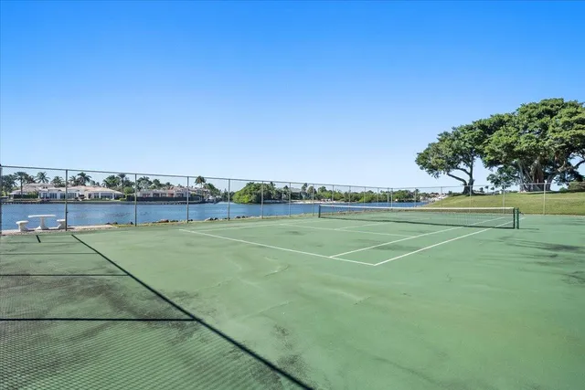 an aerial view of a house with a lake view