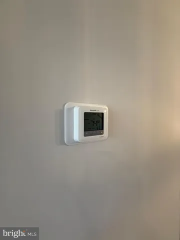 a bathroom with a toilet sink and shower