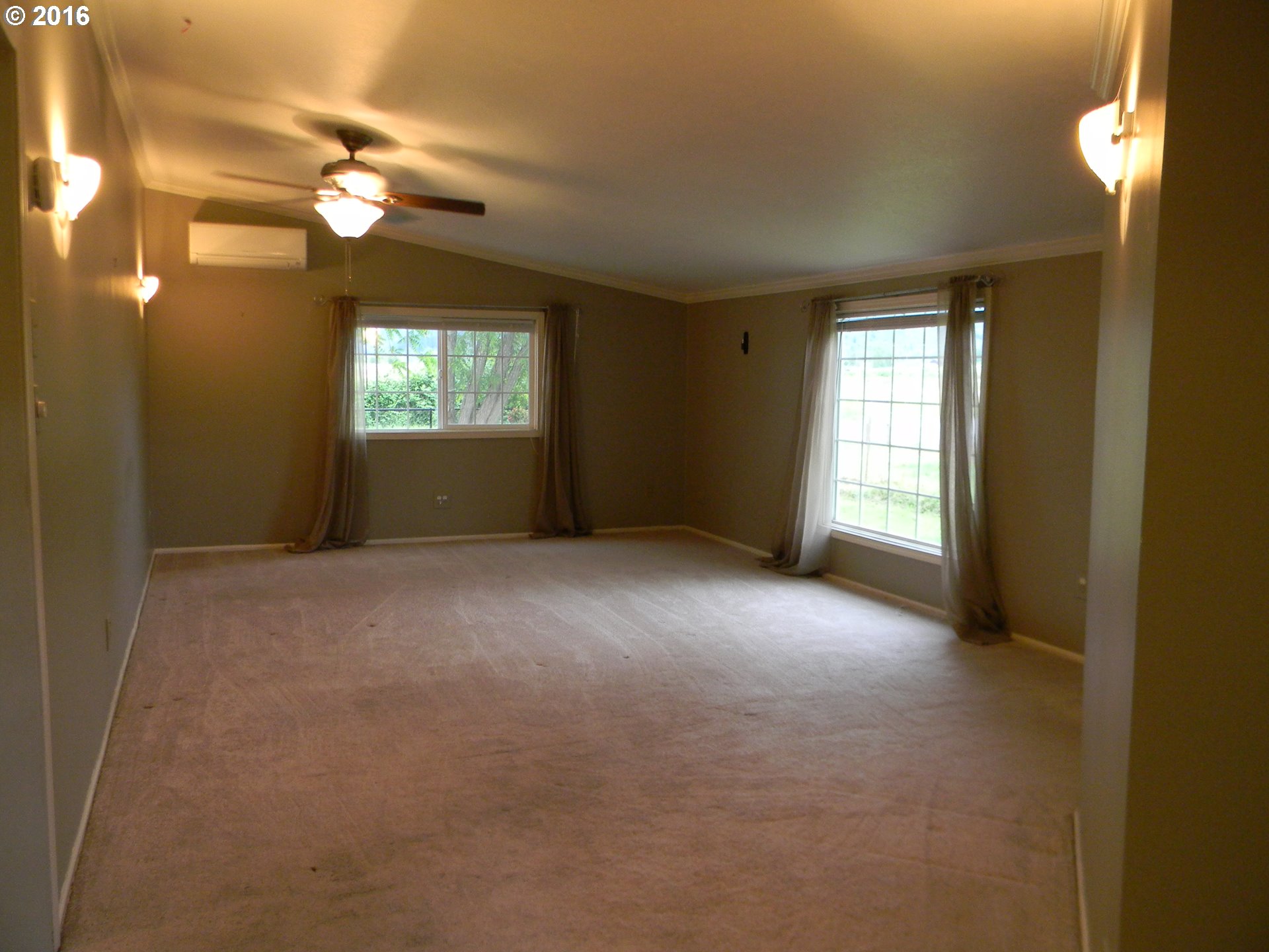 83442 Rodgers Road Creswell, OR 97426 - Photo 8 of 27 a view of an empty room with a window