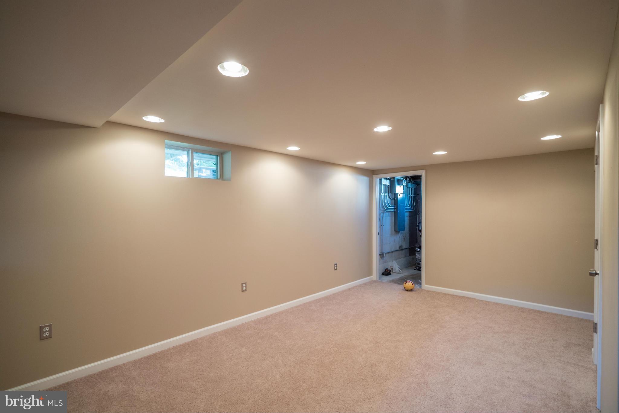 414 Brownell Road Baltimore, MD 21220 - Photo 24 of 30 Large Rec Room in Basement