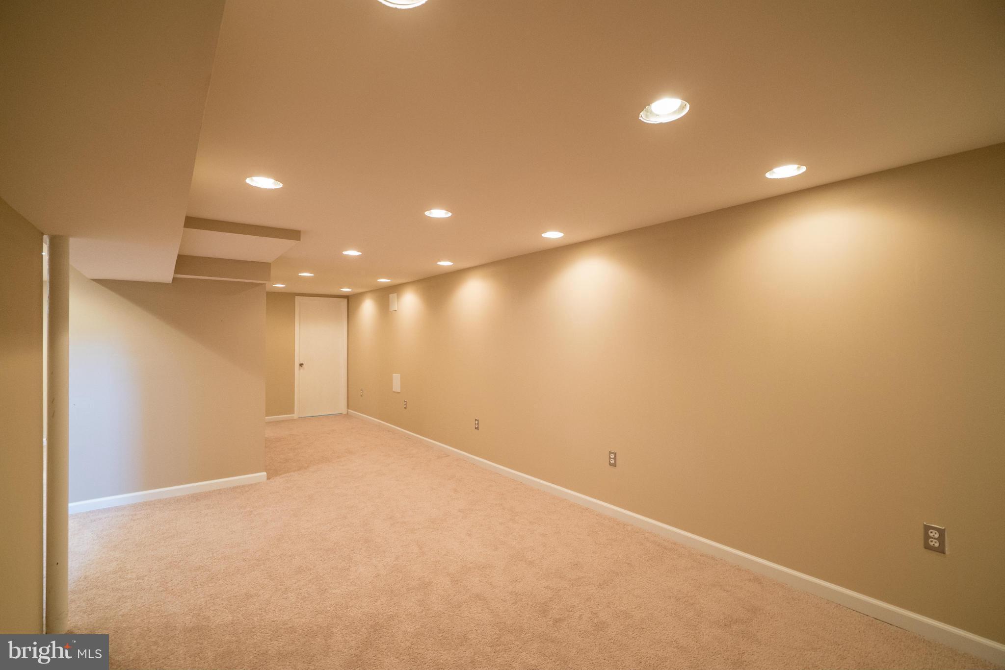 414 Brownell Road Baltimore, MD 21220 - Photo 27 of 30 Large Rec Room in Basement