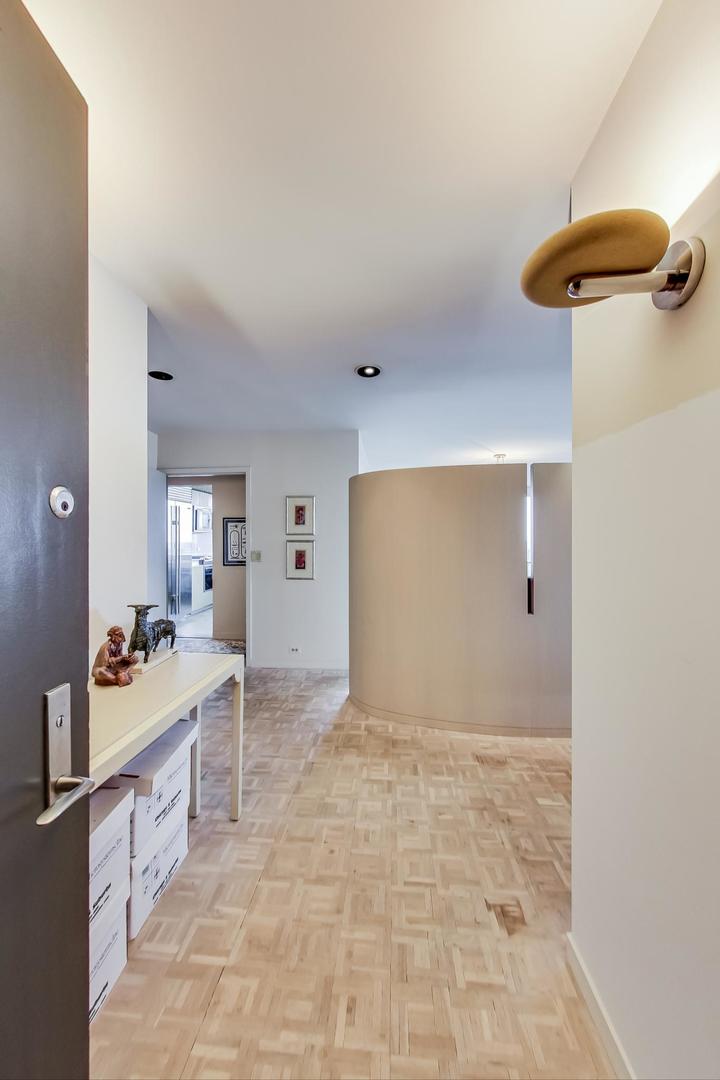 2800 North Lake Shore Drive, Unit 4216 Chicago, IL 60657 - Photo 15 of 29 a view of a room with shelves