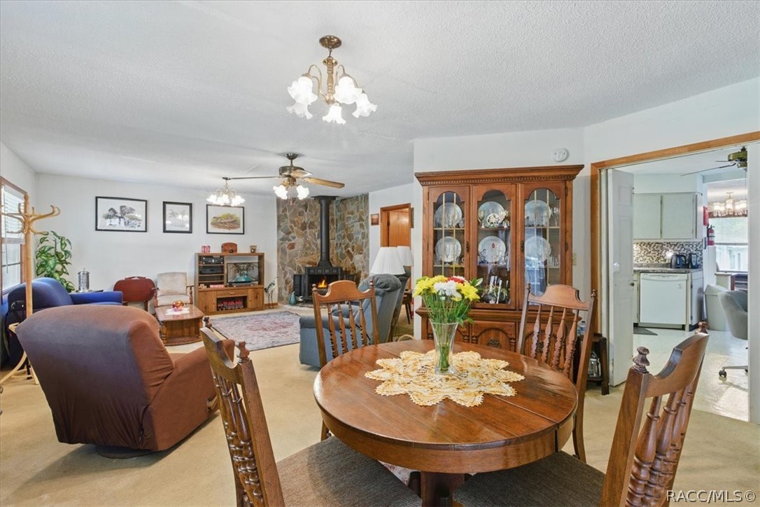 6 62nd Street Yankeetown, FL 34498 - Photo 8 of 55 a view of a dining room with furniture window and outside view