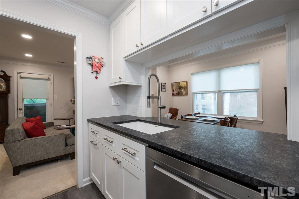 3245 Mill Run, Unit 3245 Raleigh, NC 27612 - Photo 12 of 24 a kitchen with sink and window