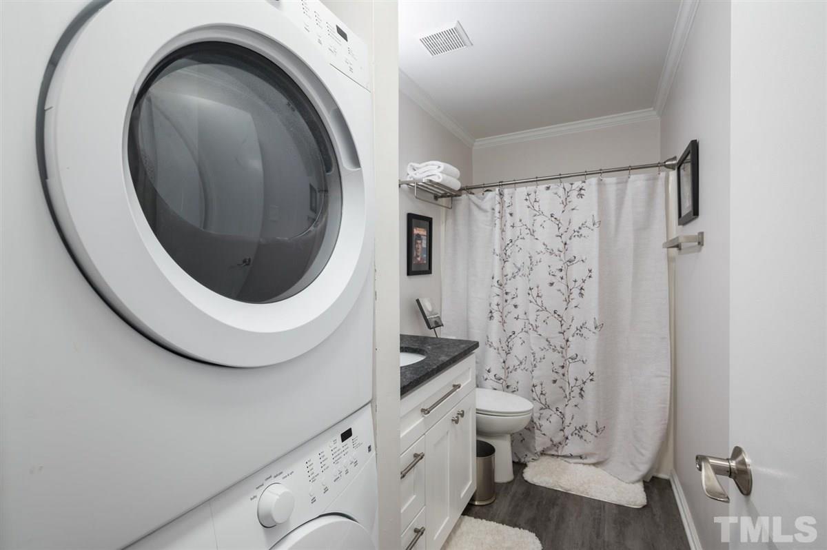 3245 Mill Run, Unit 3245 Raleigh, NC 27612 - Photo 16 of 24 a bathroom with a toilet and a sink
