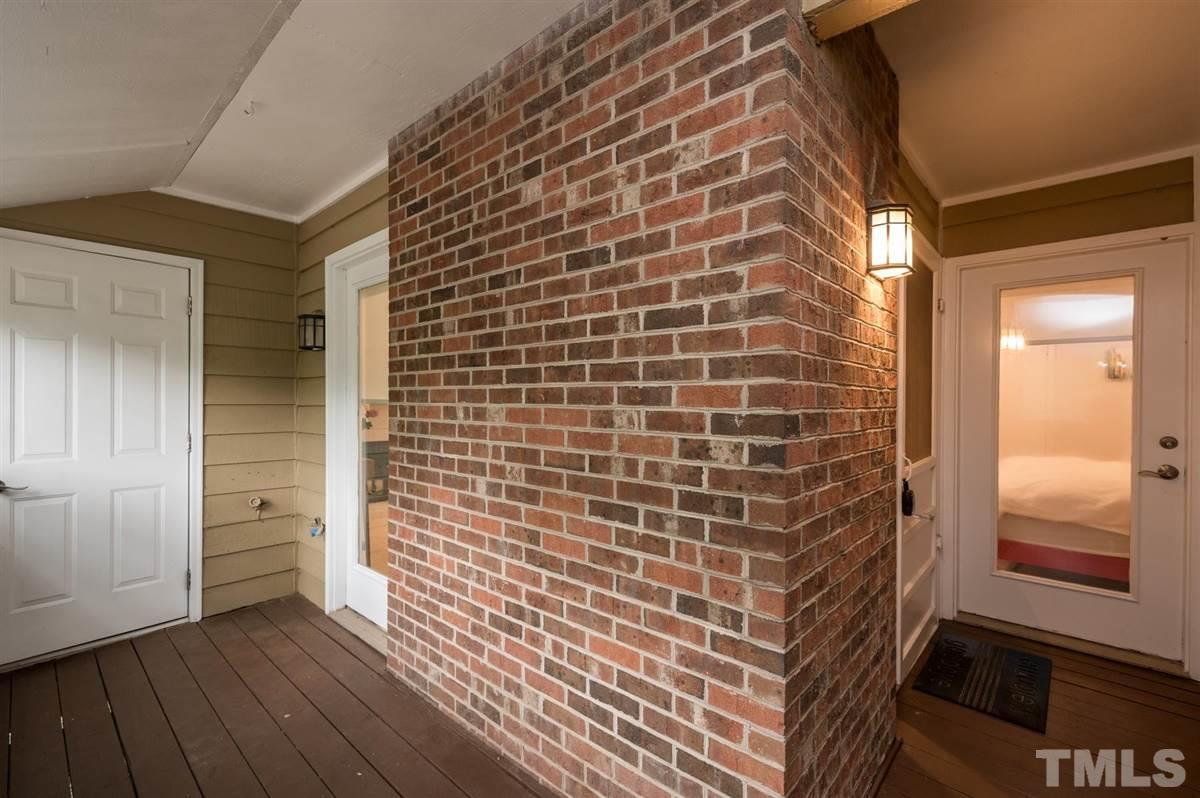 3245 Mill Run, Unit 3245 Raleigh, NC 27612 - Photo 22 of 24 a view of a brick wall