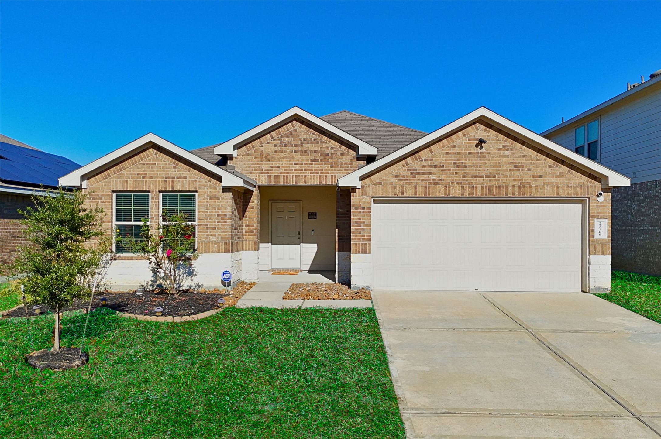 23706 Blodgett Peak Trail Spring, TX 77373 - Photo 1 of 31 a front view of a house with garden