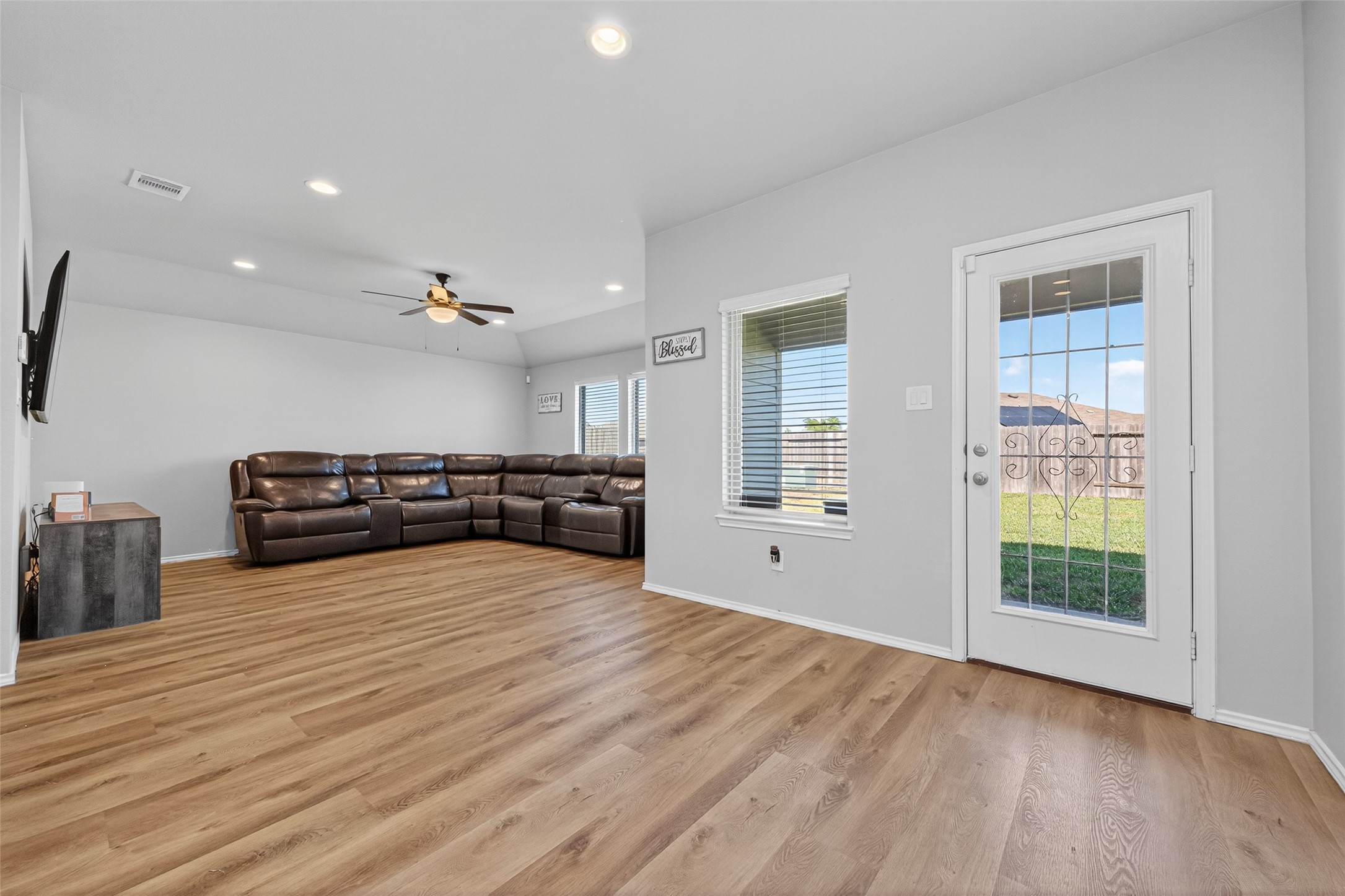 23706 Blodgett Peak Trail Spring, TX 77373 - Photo 11 of 31 a living room with furniture and a wooden floor