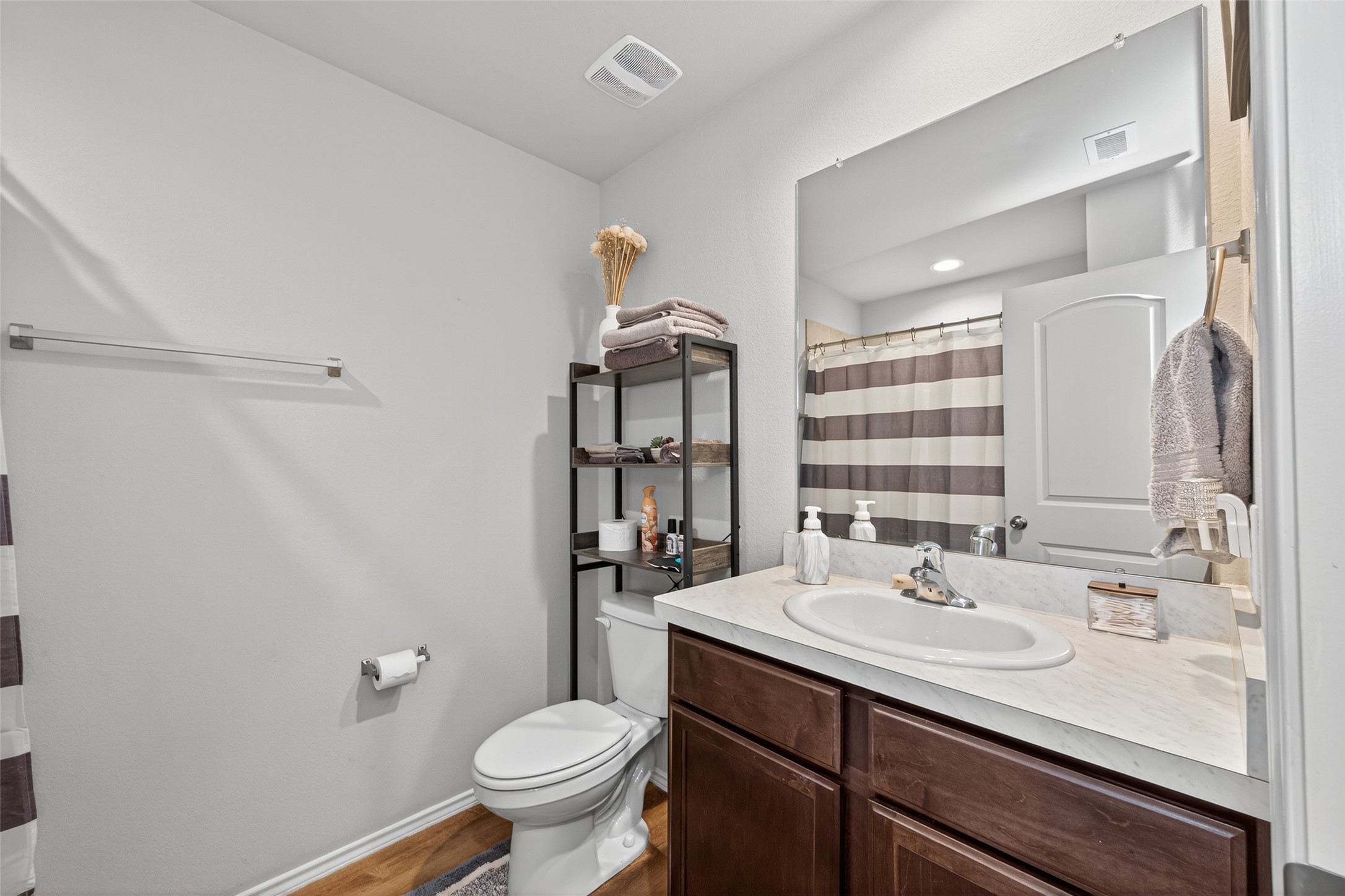 23706 Blodgett Peak Trail Spring, TX 77373 - Photo 22 of 31 a bathroom with a sink toilet and shower