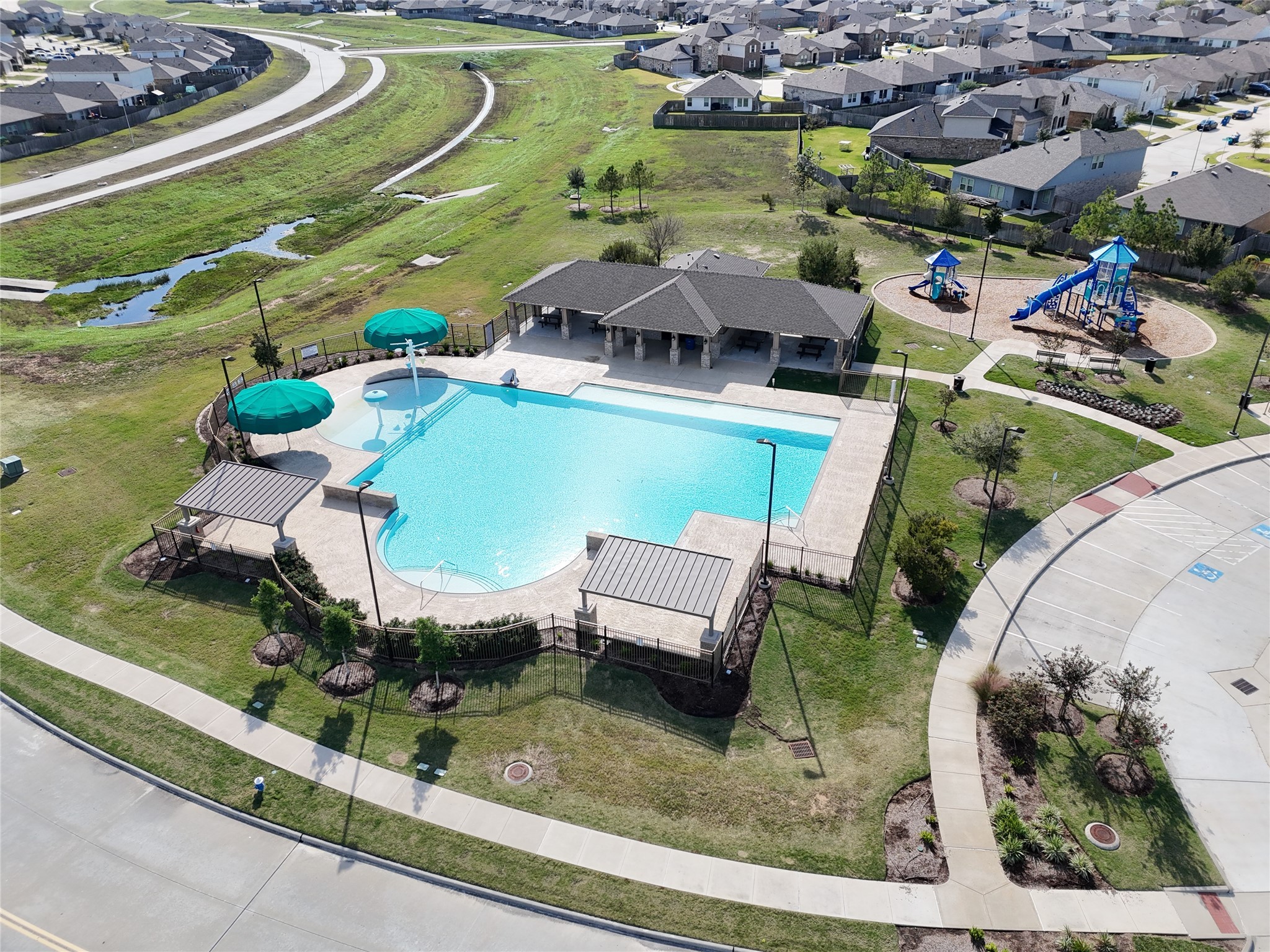23706 Blodgett Peak Trail Spring, TX 77373 - Photo 27 of 31 an aerial view of a house with a yard and lake view