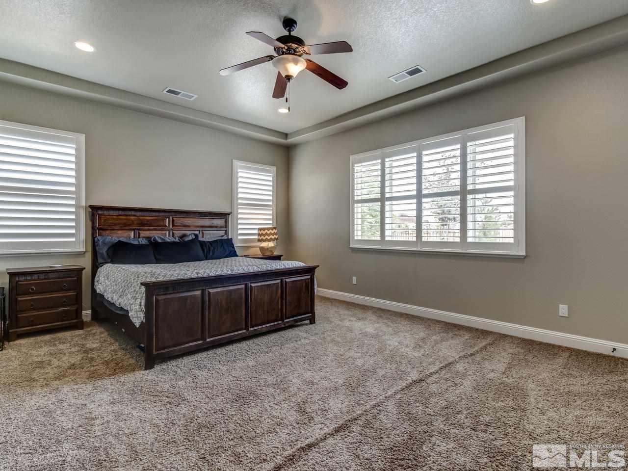 505 Split Rail Court Sparks, NV 89441 - Photo 11 of 25 a bedroom with a bed and window