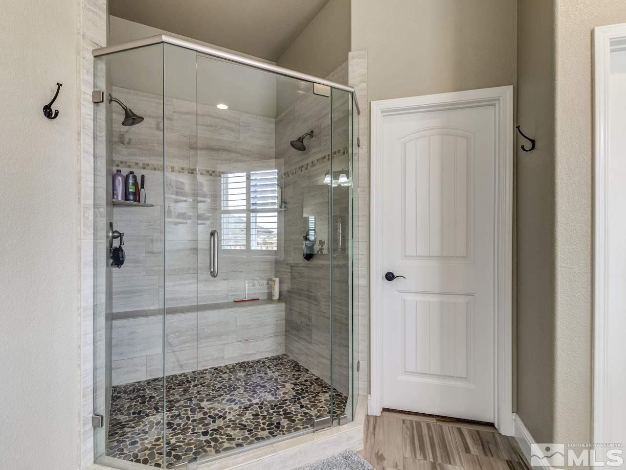 505 Split Rail Court Sparks, NV 89441 - Photo 14 of 25 a bathroom with a glass shower door