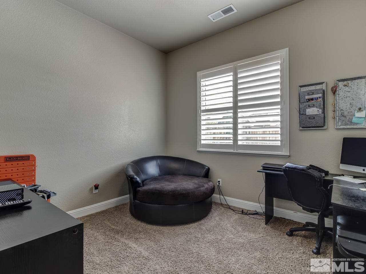 505 Split Rail Court Sparks, NV 89441 - Photo 20 of 25 a room with furniture and a window