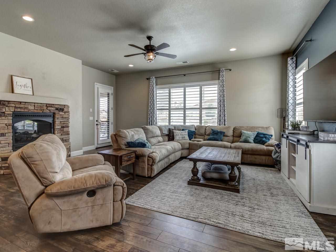 505 Split Rail Court Sparks, NV 89441 - Photo 9 of 25 a living room with furniture and a fireplace
