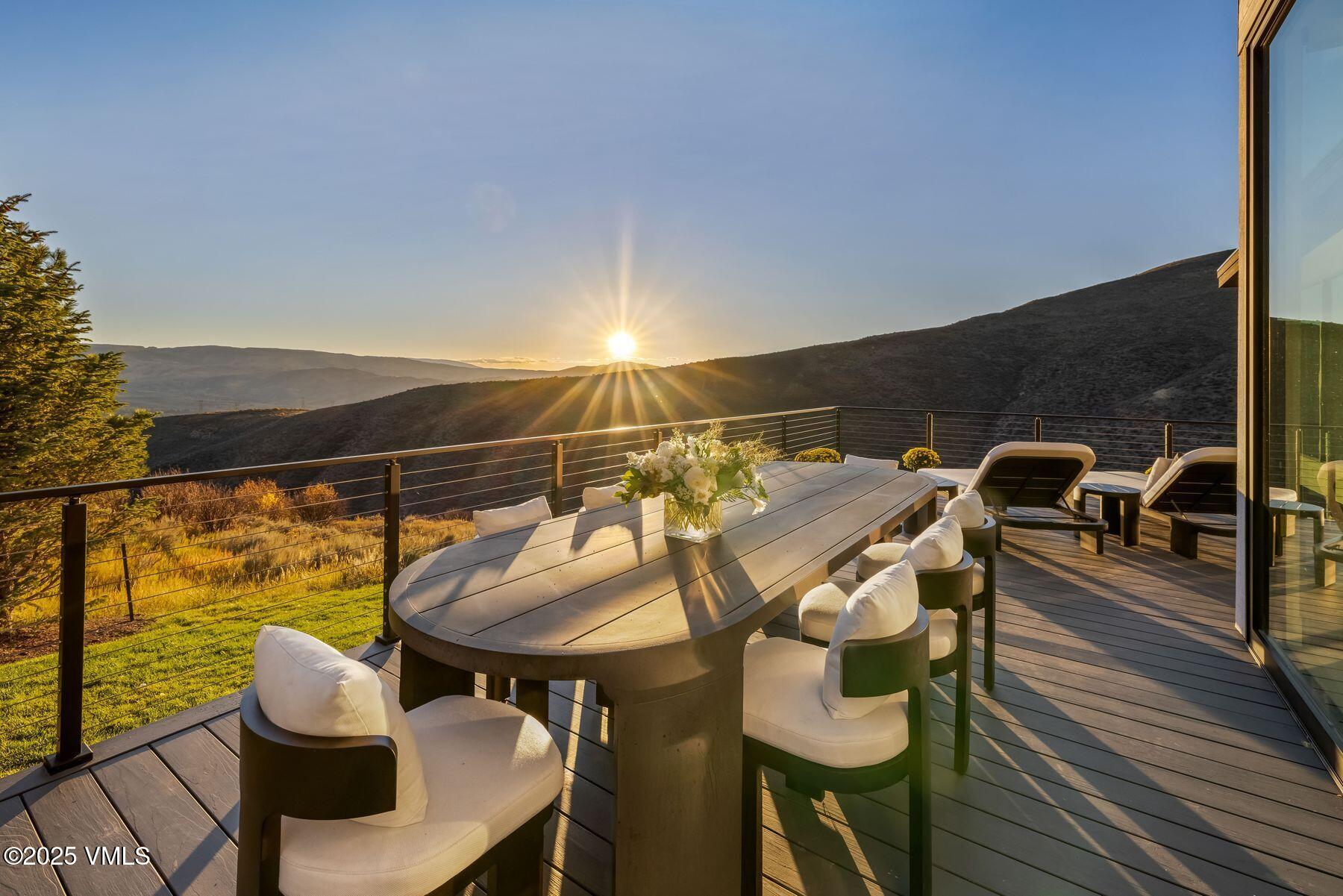 4380 June Point Avon, CO 81620 - Photo 25 of 52 Back patio area Fall/Sunset