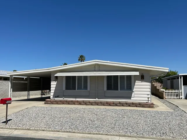 a front view of a house with windows