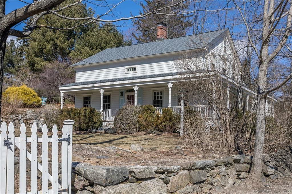 1 Satterlee Road New Fairfield, CT 06812 - Photo 1 of 1 Front with wrap around mahogany porch and water views.