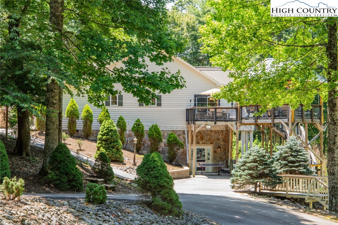1328 Don Bare Road Jefferson, NC 28640 - Photo 7 of 49 a front view of a house with garden