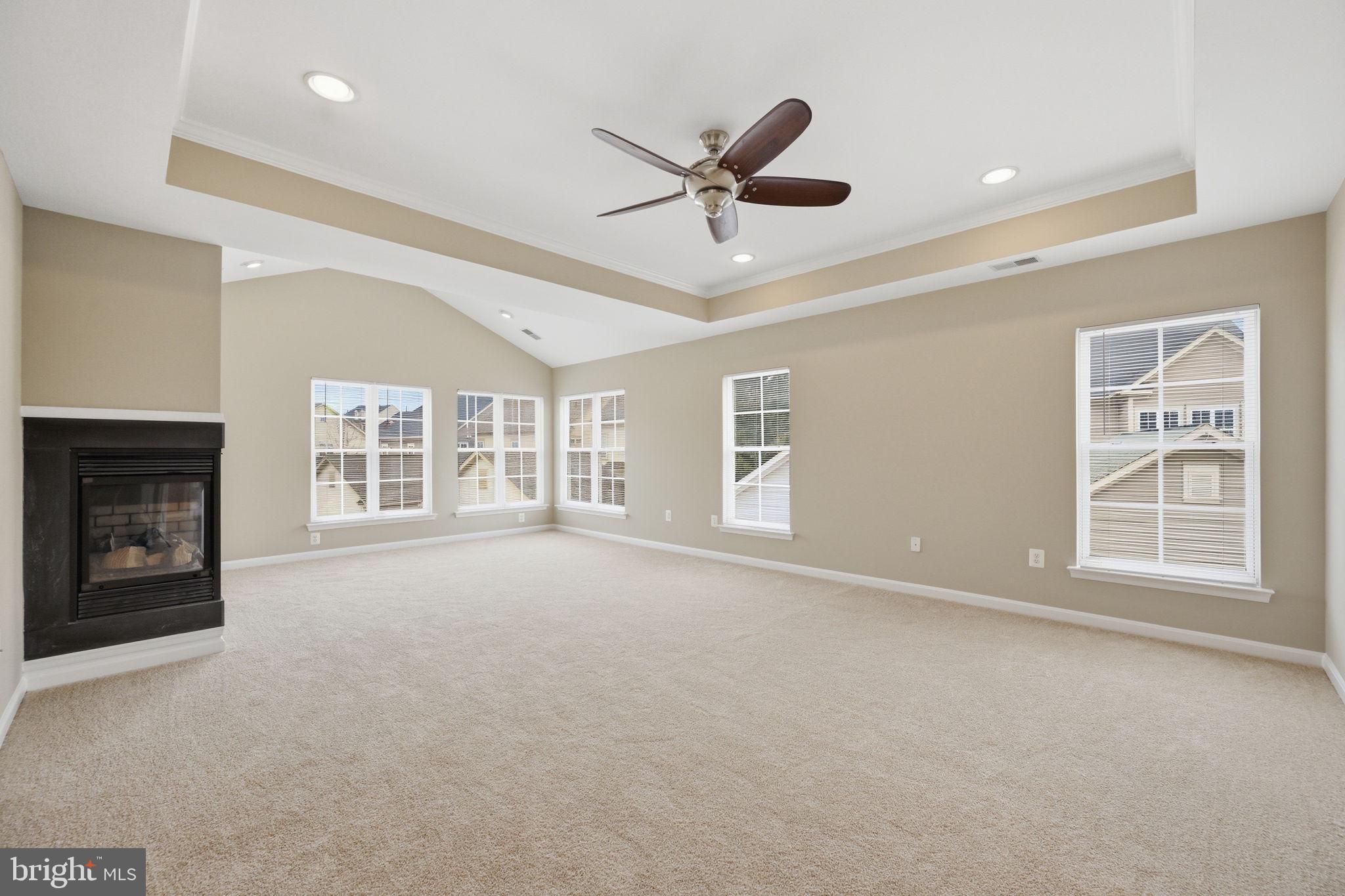 23710 Grapevine Ridge Terrace Clarksburg, MD 20871 - Photo 22 of 49 Primary Bed w/ two sided fireplace