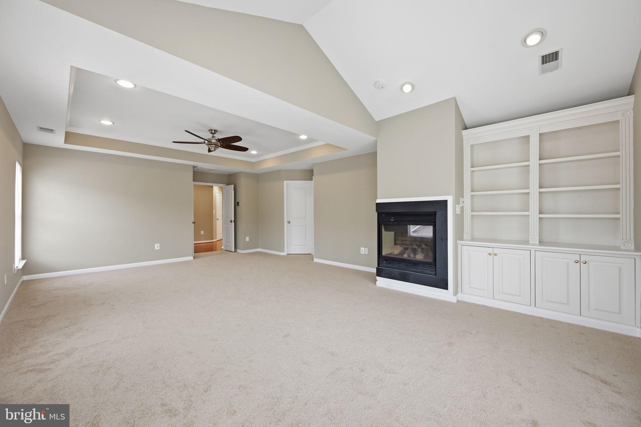 23710 Grapevine Ridge Terrace Clarksburg, MD 20871 - Photo 24 of 49 Primary Bed w/ two sided fireplace
