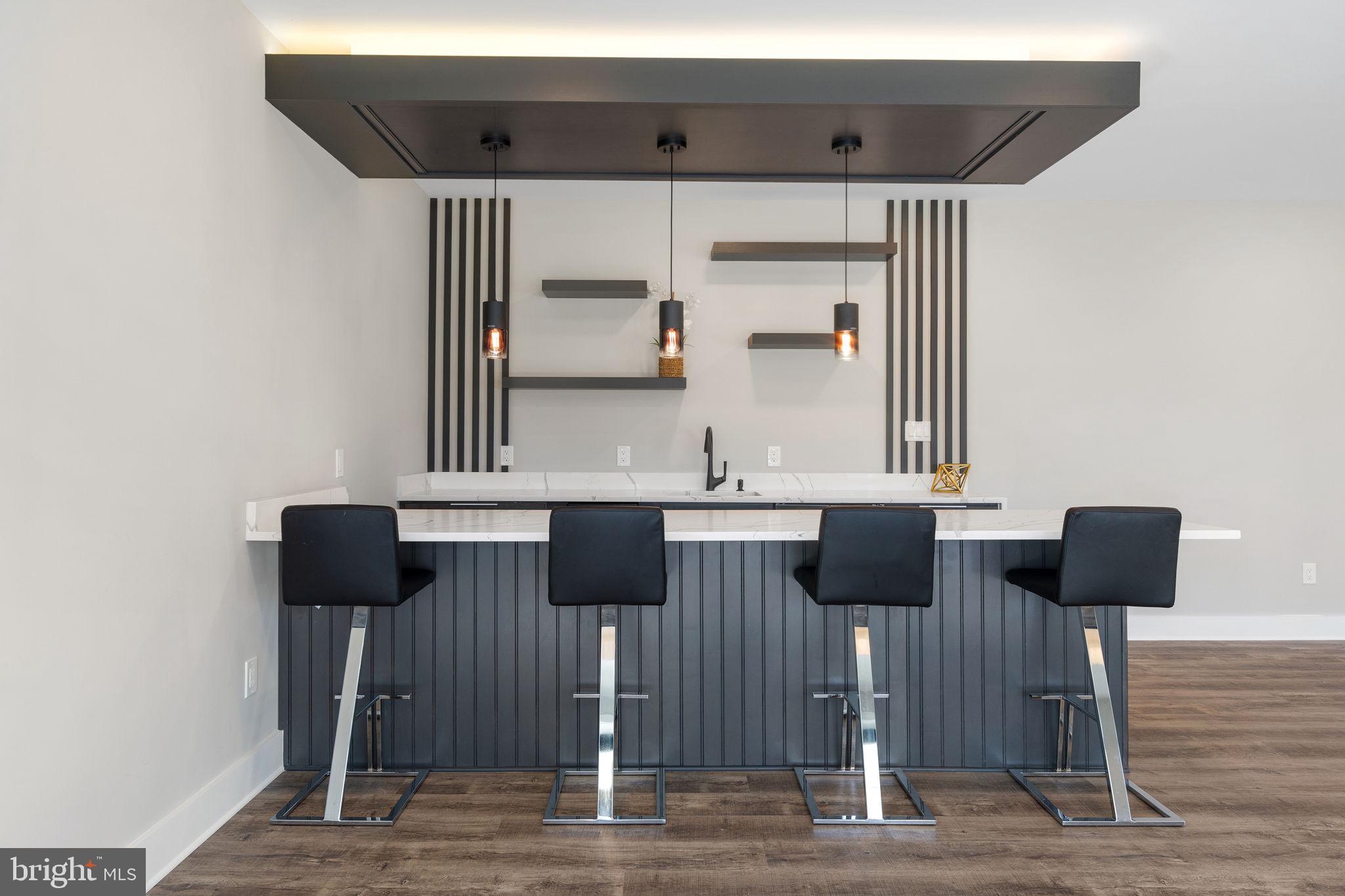 3113 Circle Hill Road Alexandria, VA 22305 - Photo 64 of 78 Walk-behind wet bar custom cabinetry & quartz