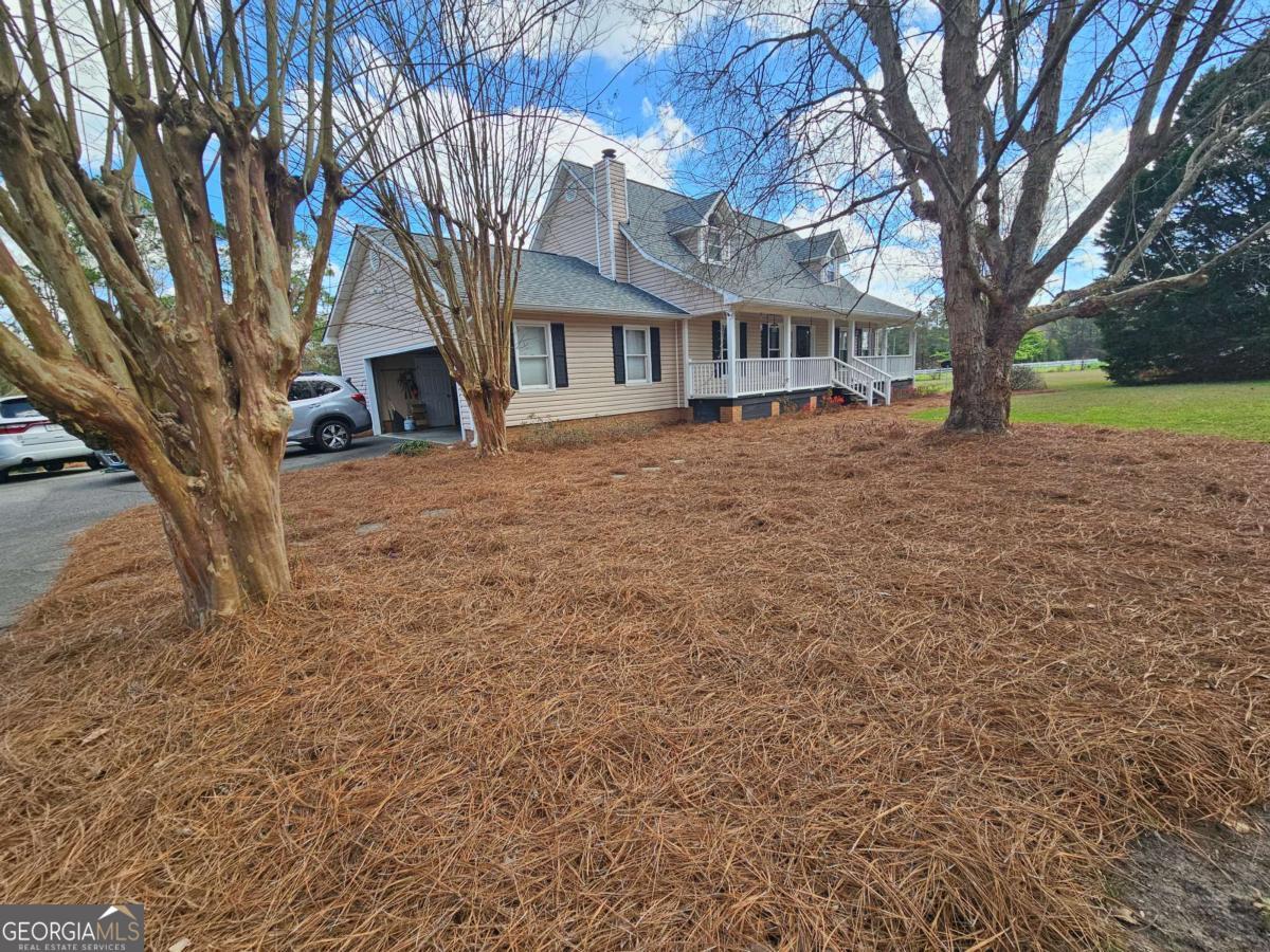 2001 Rutland Road, Unit 1 Tifton, GA 31793 - Photo 14 of 51 a view of house with yard