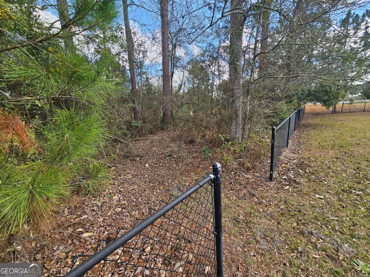 2001 Rutland Road, Unit 1 Tifton, GA 31793 - Photo 20 of 51 a view of a forest filled with trees