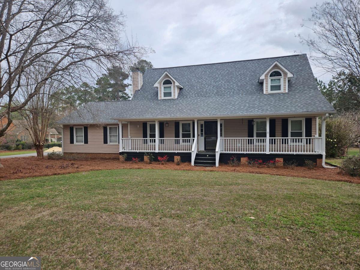 2001 Rutland Road, Unit 1 Tifton, GA 31793 - Photo 2 of 51 a view of a house with a yard