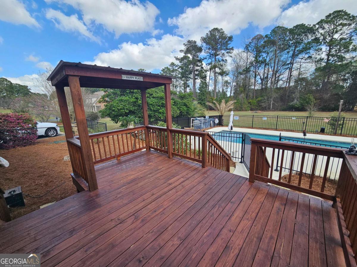 2001 Rutland Road, Unit 1 Tifton, GA 31793 - Photo 24 of 51 a view of a balcony with wooden floor