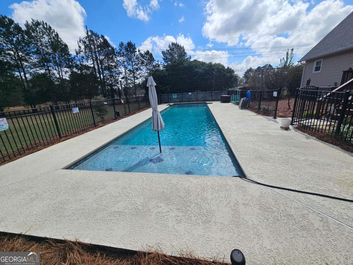 2001 Rutland Road, Unit 1 Tifton, GA 31793 - Photo 27 of 51 swimming pool view from a balcony