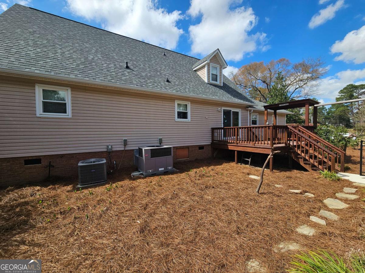 2001 Rutland Road, Unit 1 Tifton, GA 31793 - Photo 28 of 51 a view of a house with a patio