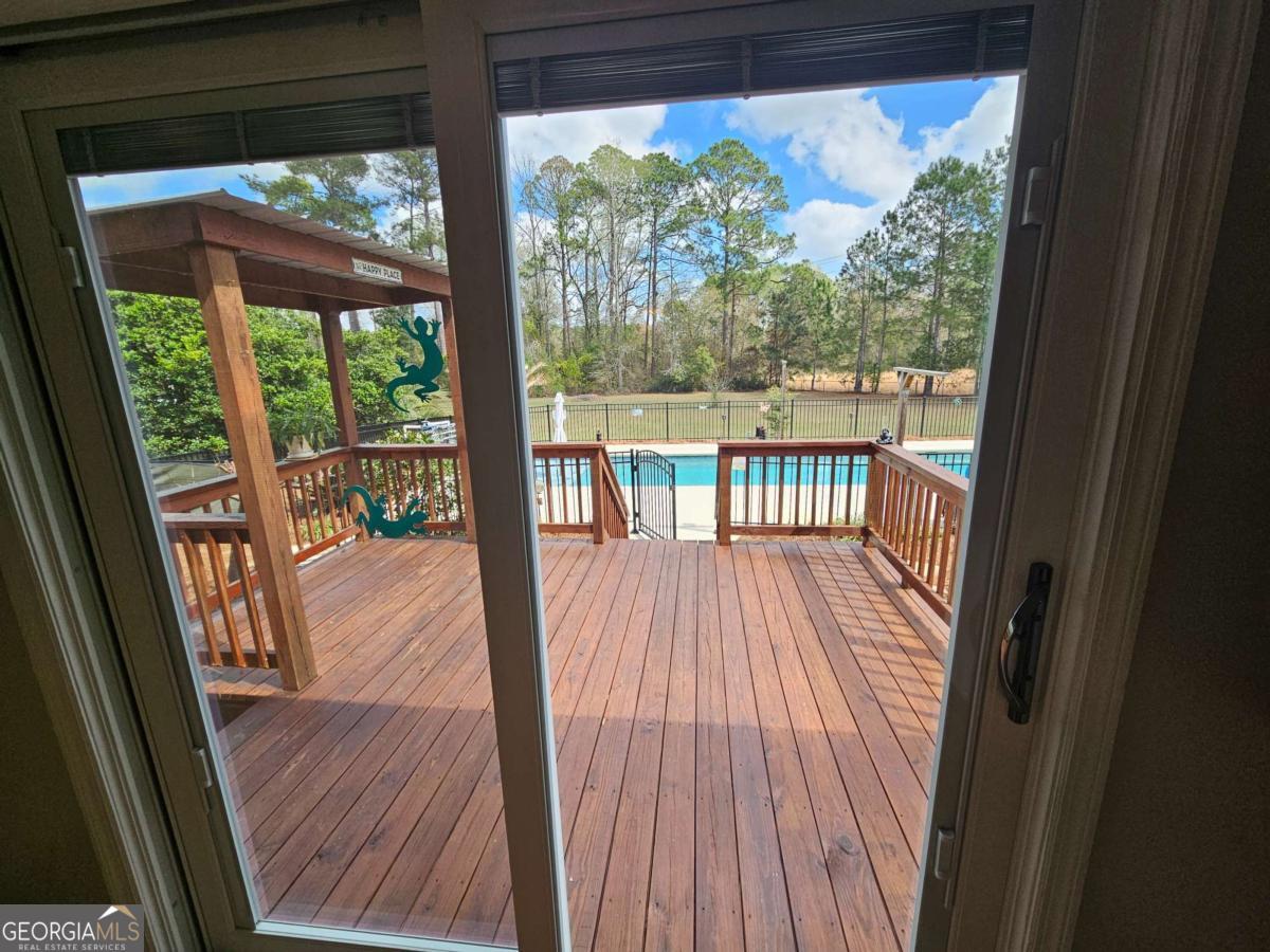 2001 Rutland Road, Unit 1 Tifton, GA 31793 - Photo 30 of 51 a view of balcony with wooden floor