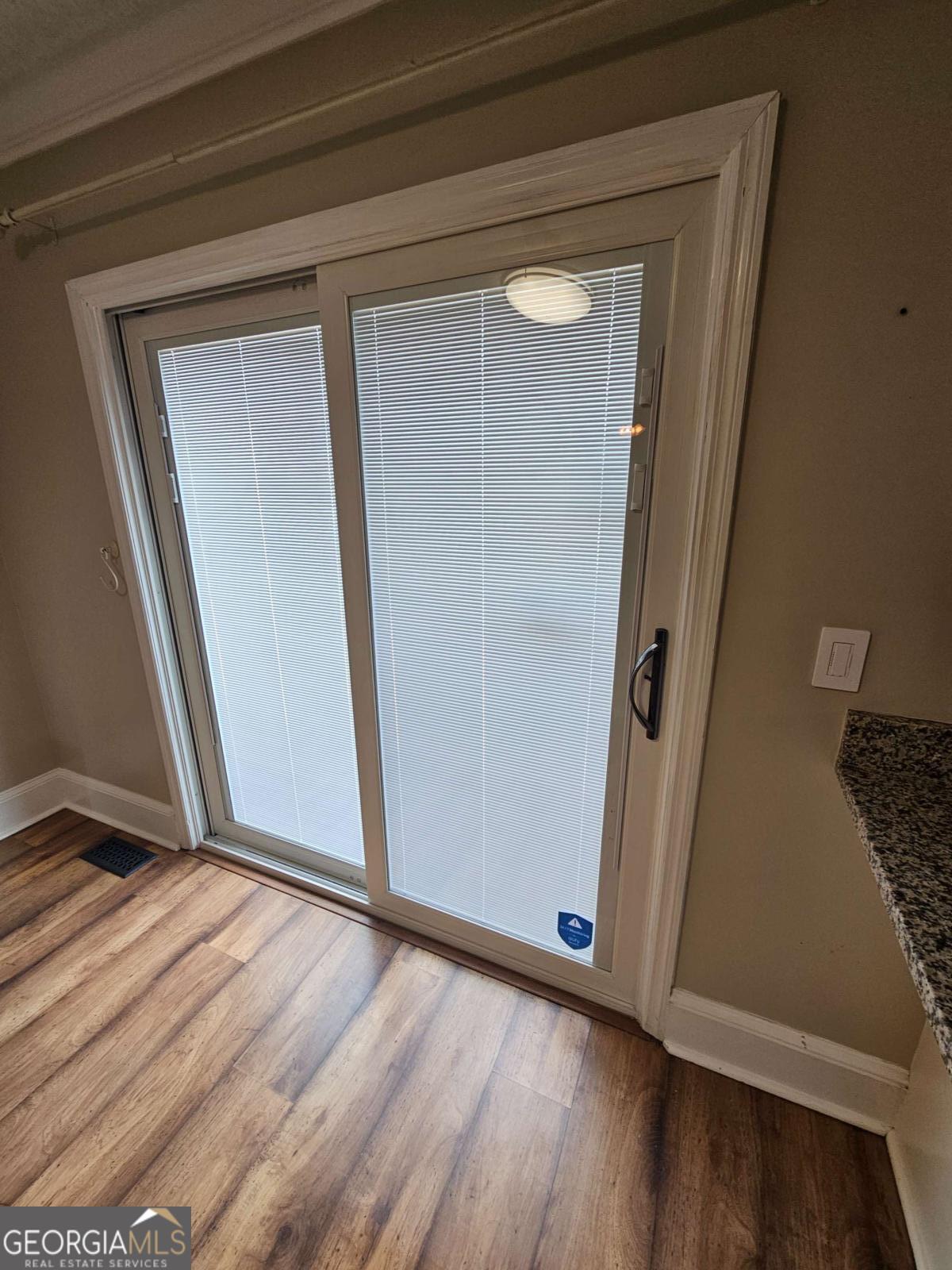 2001 Rutland Road, Unit 1 Tifton, GA 31793 - Photo 32 of 51 a view of front door with wooden floor