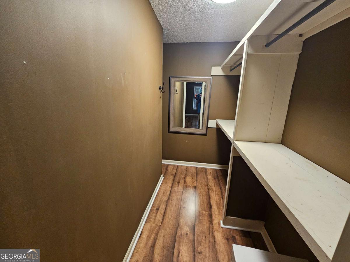 2001 Rutland Road, Unit 1 Tifton, GA 31793 - Photo 47 of 51 a view of stairs and with wooden floor