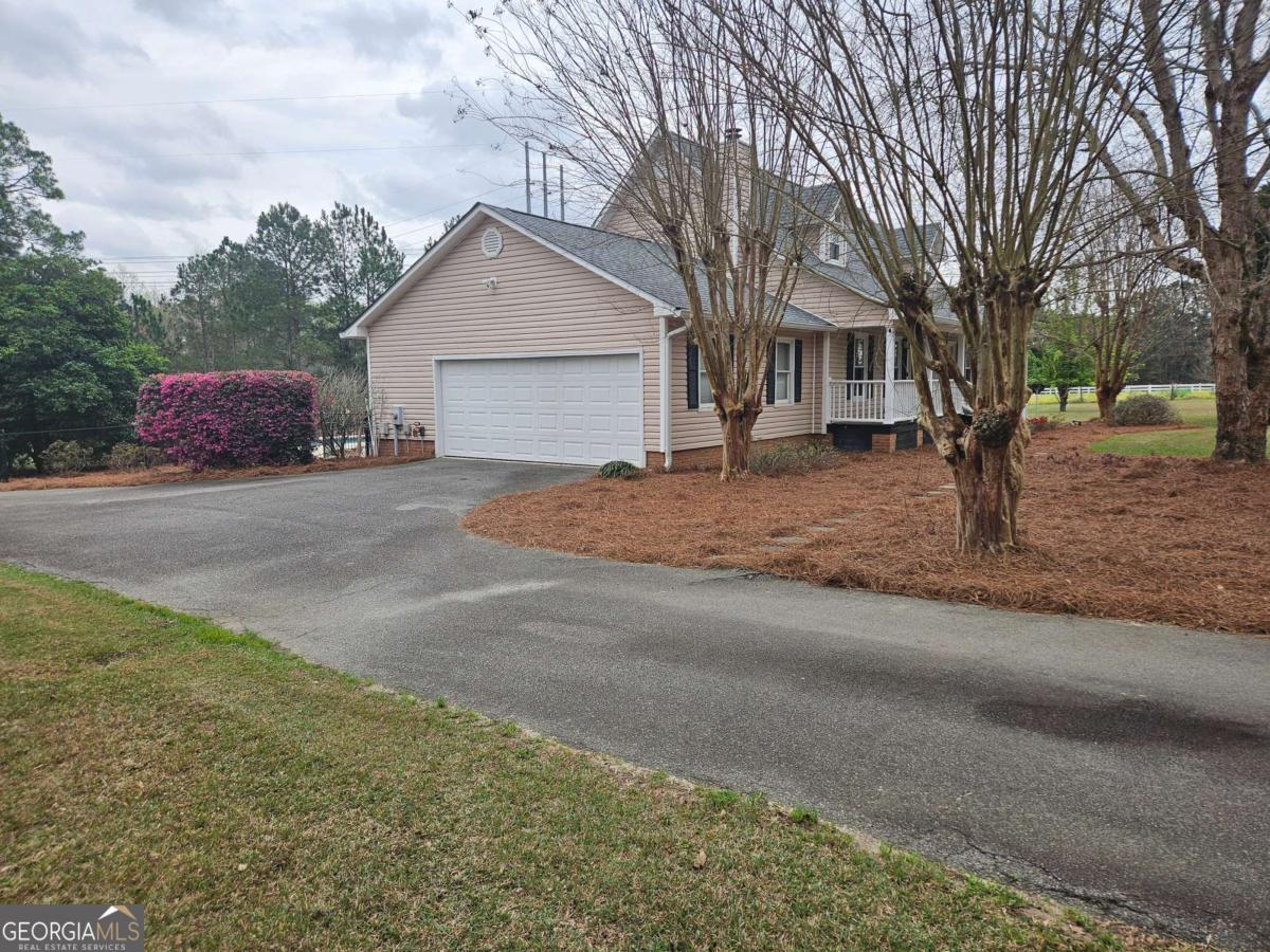 2001 Rutland Road, Unit 1 Tifton, GA 31793 - Photo 5 of 51 a view of a house with a outdoor space