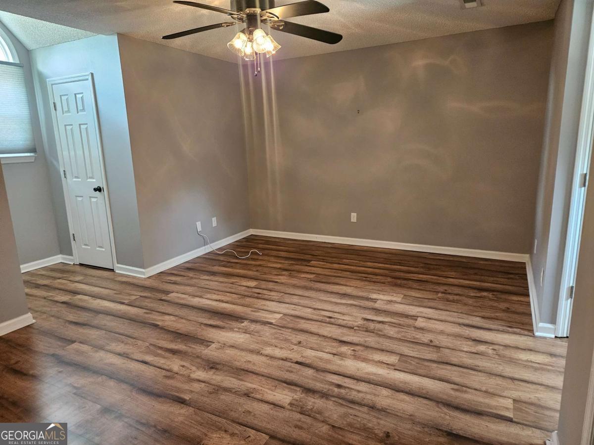 2001 Rutland Road, Unit 1 Tifton, GA 31793 - Photo 51 of 51 a view of empty room with wooden floor