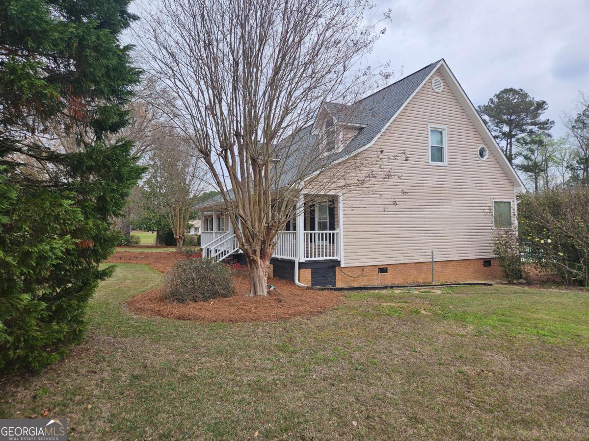 2001 Rutland Road, Unit 1 Tifton, GA 31793 - Photo 8 of 51 a view of a house with a yard