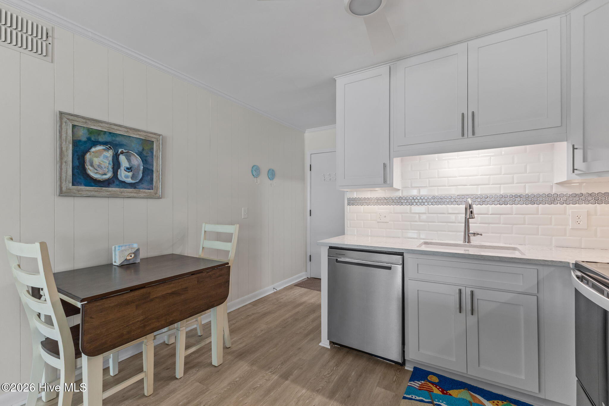 301 Commerce Way, Unit 138 Atlantic Beach, NC 28512 - Photo 7 of 27 Extra chairs and table opens up