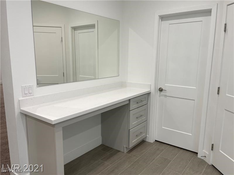 6632 Rashelda Court Las Vegas, NV 89130 - Photo 17 of 27 Vanity at primary bathroom