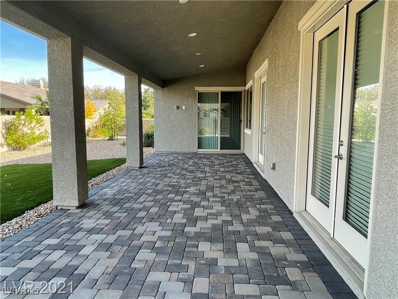 6632 Rashelda Court Las Vegas, NV 89130 - Photo 20 of 27 Large covered patio with pavers, recessed lights and tv electrical outlet
