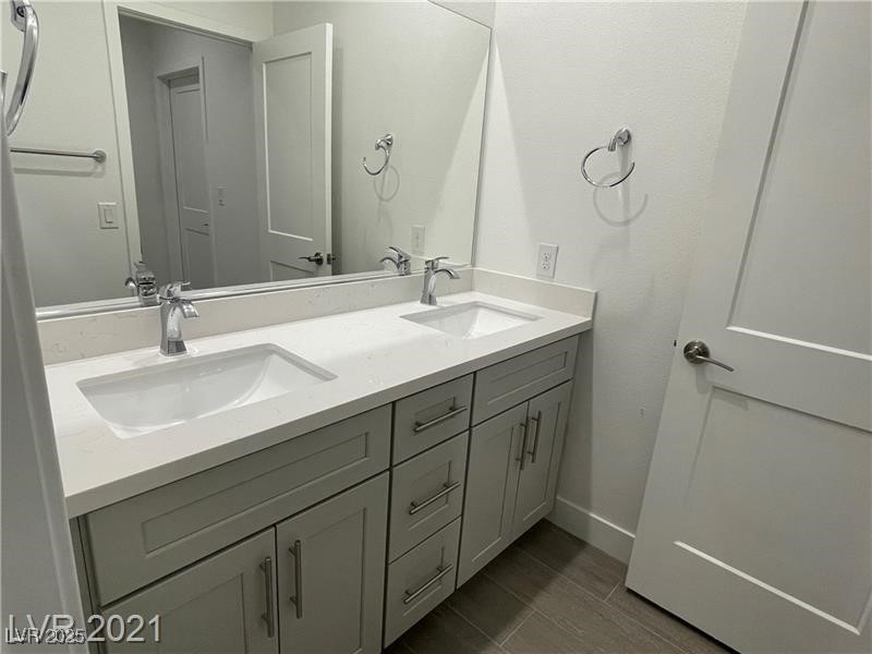 6632 Rashelda Court Las Vegas, NV 89130 - Photo 23 of 27 Vanity at bathroom 2