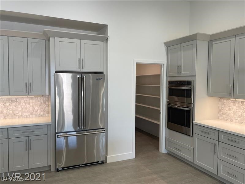 6632 Rashelda Court Las Vegas, NV 89130 - Photo 8 of 27 Upgraded stainless appliances and walk in pantry