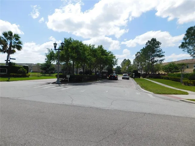 a view of street with houses