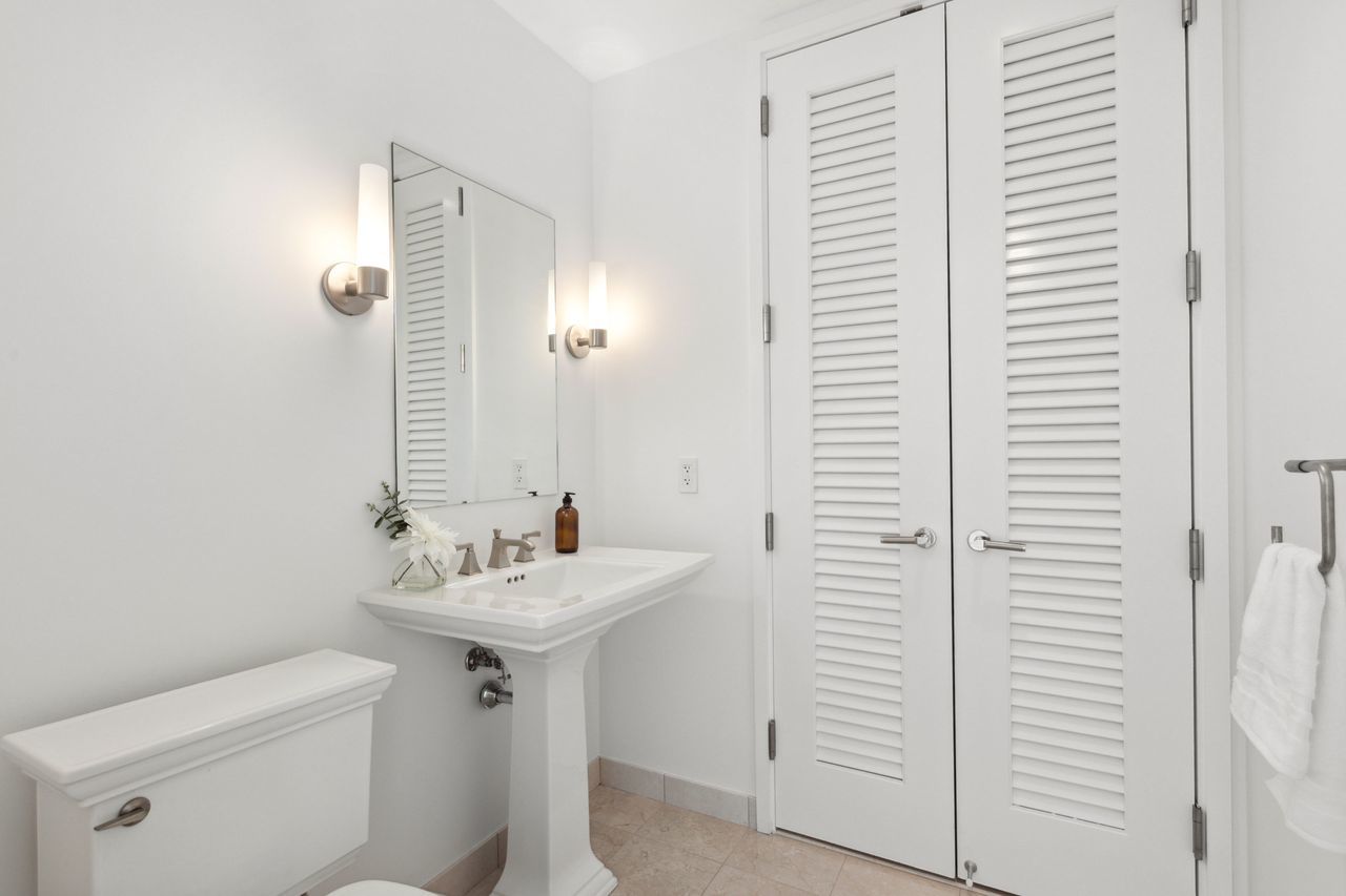 401 North Wabash Avenue, Unit 30I Chicago, IL 60611 - Photo 26 of 49 a bathroom with a sink a toilet and shower