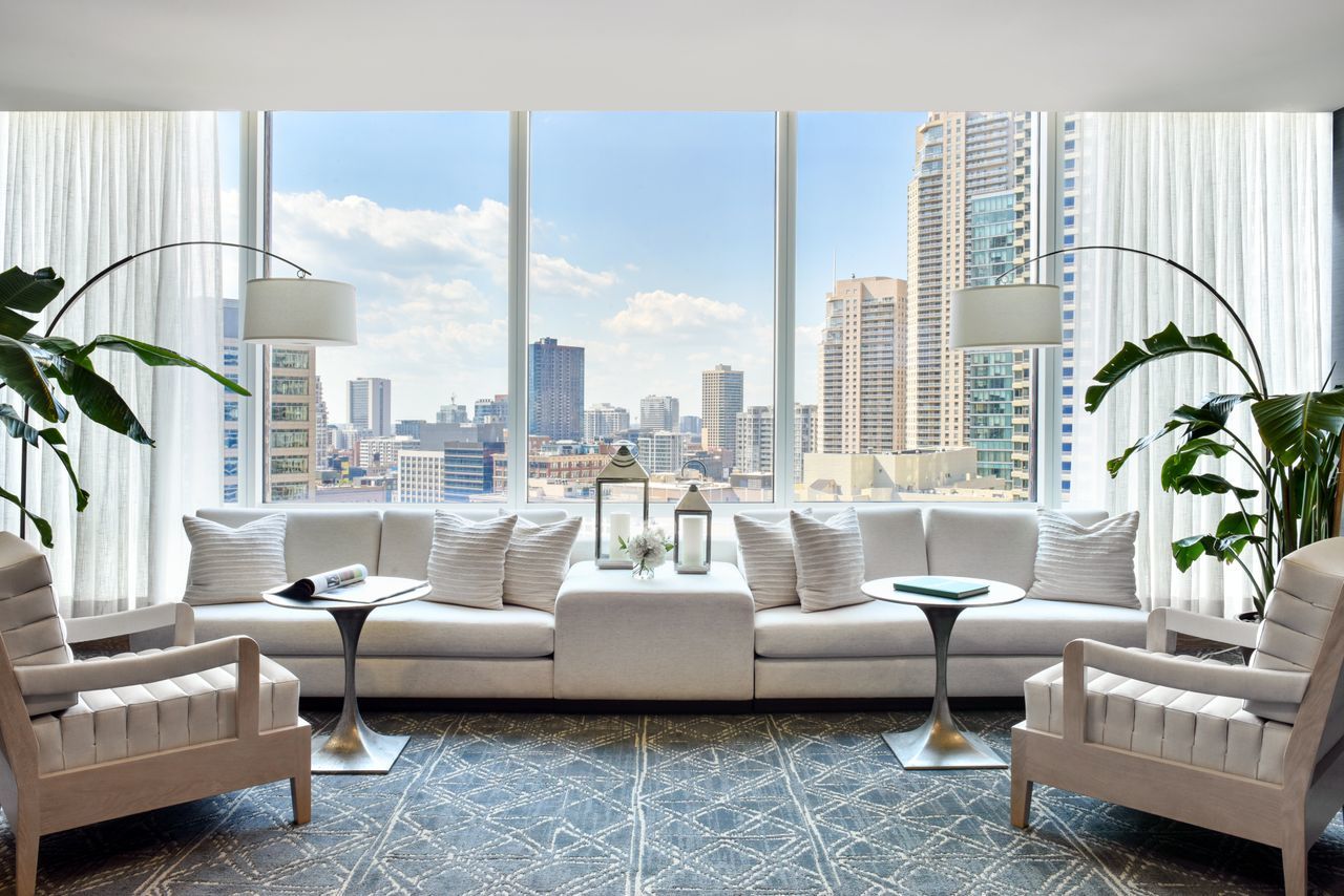 401 North Wabash Avenue, Unit 30I Chicago, IL 60611 - Photo 38 of 49 a living room with furniture and a large window