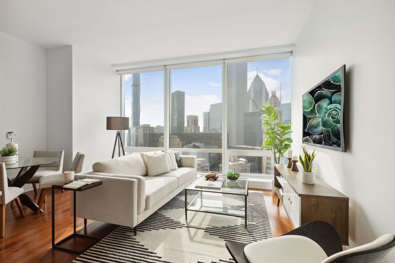 401 North Wabash Avenue, Unit 30I Chicago, IL 60611 - Photo 6 of 49 a living room with furniture and a large window