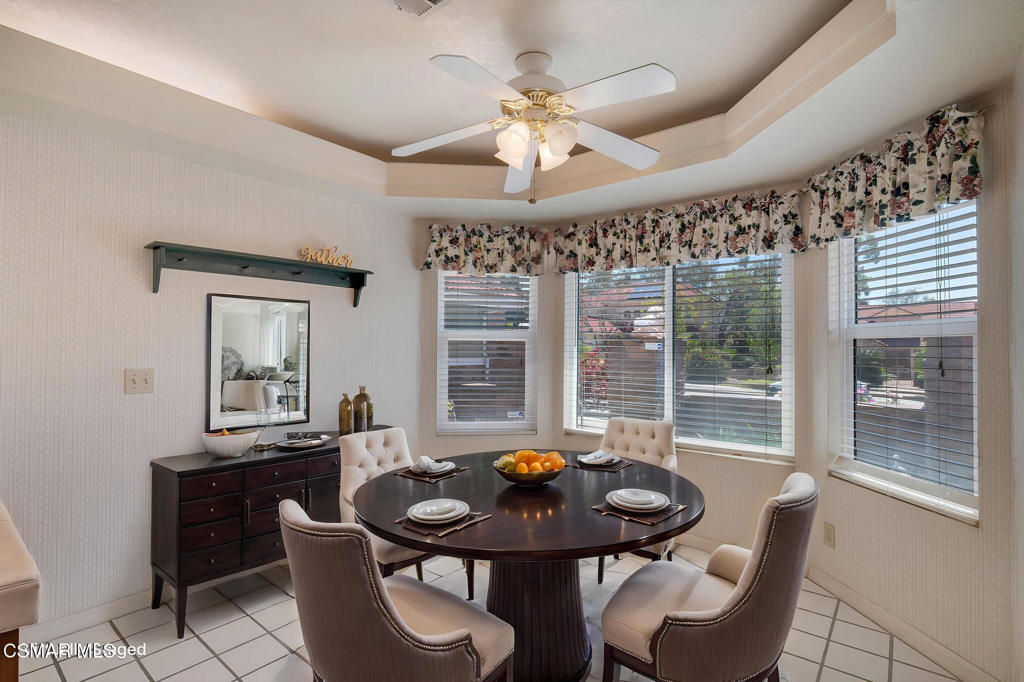 5339 Seneca Place Simi Valley, CA 93063 - Photo 24 of 76 a view of a dining room with furniture wooden floor and chandelier