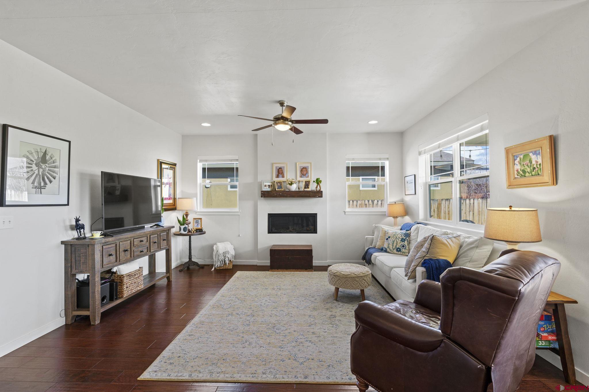 155 Prospector Avenue Durango, CO 81301 - Photo 13 of 35 a living room with furniture and a flat screen tv